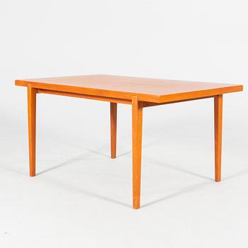 A mid 20th century dining table.