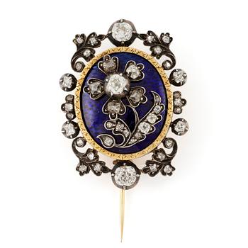 522A. Brosch 18K guld och silver med emalj samt gammal- och rosenslipade diamanter.