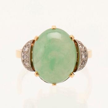 Börje Löfgren, ring in 18K white and red gold with an oval cabochon-cut jadeite and single-cut diamonds, Stockholm 1964.