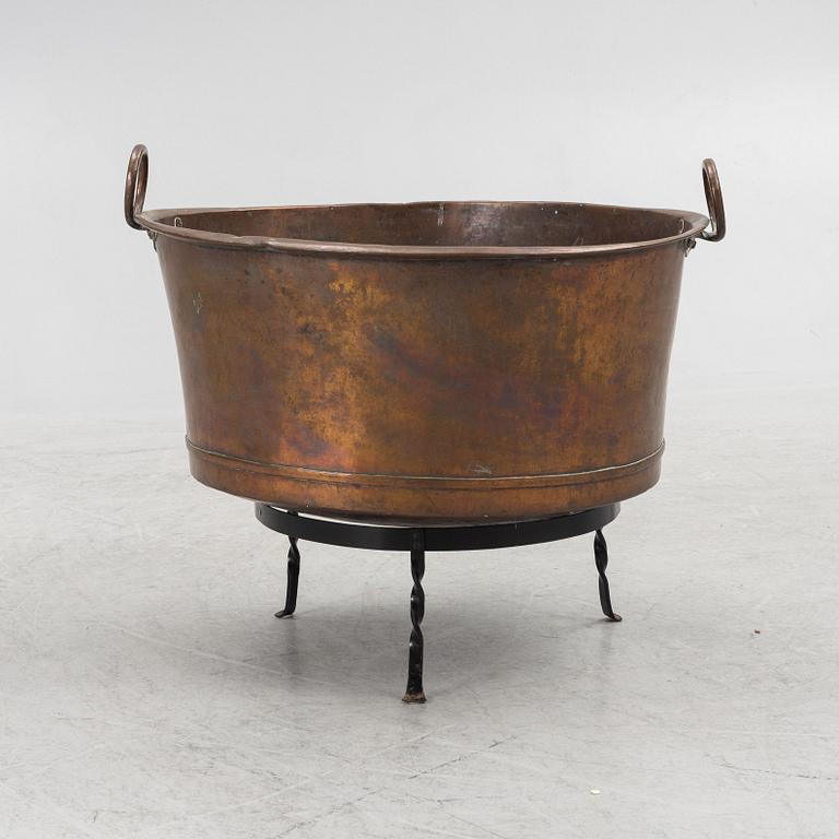 A 19th century copper tub.