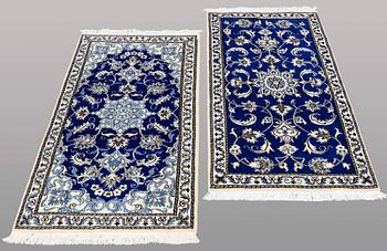 Two Nain rugs 140 x 69 and 134 x 69 cm.