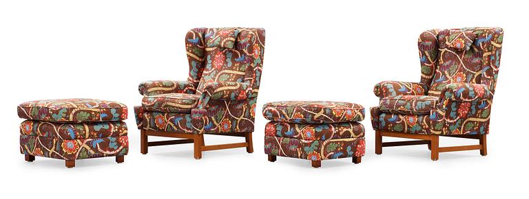 A pair of Svenskt Tenn armchairs with ottomans, model 3543, "Oxford".