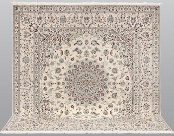 A Nain part silk carpet, c. 207 x 208 cm.