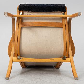 Yngve Ekström, a 'Lamino' armchair with ottoman, Swedese.