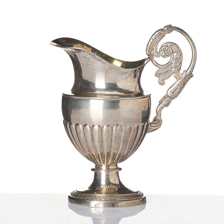 A Swedish parcel-gilt silver cream-jug, mark of Johan Petter Grönvall, Stockholm 1831.