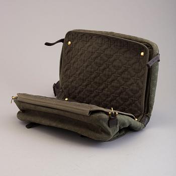 Bag/changing bag by Louis Vuitton.