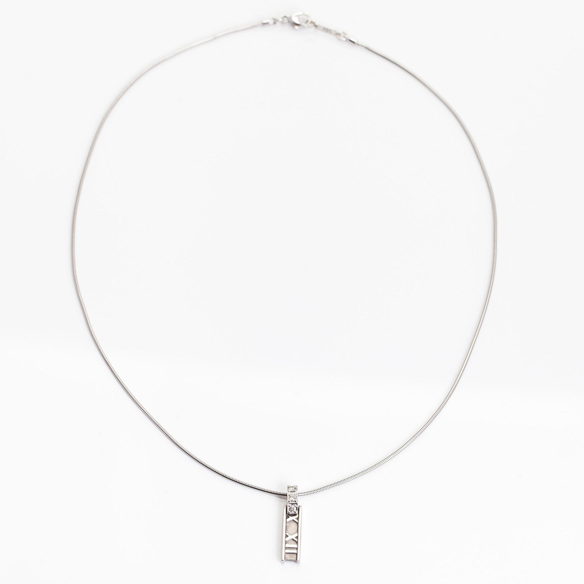 Tiffany & Co, a 18K white gold 'Atlas Bar' necklace with diamonds ca 0.06 ct.