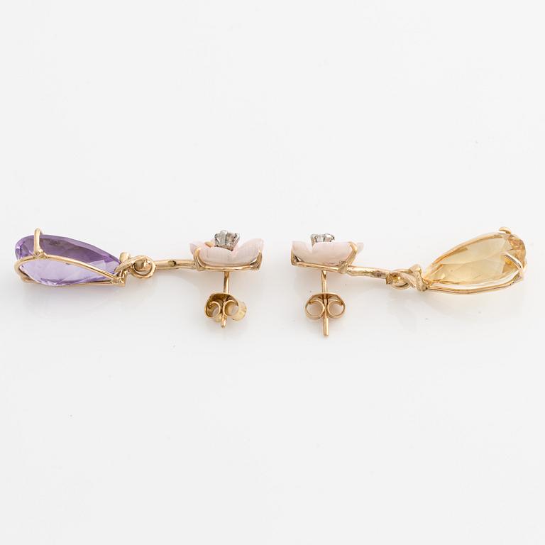 Earrings with amethysts, citrines, carved mother-of-pearl in the shape of a flower with brilliant-cut diamonds.