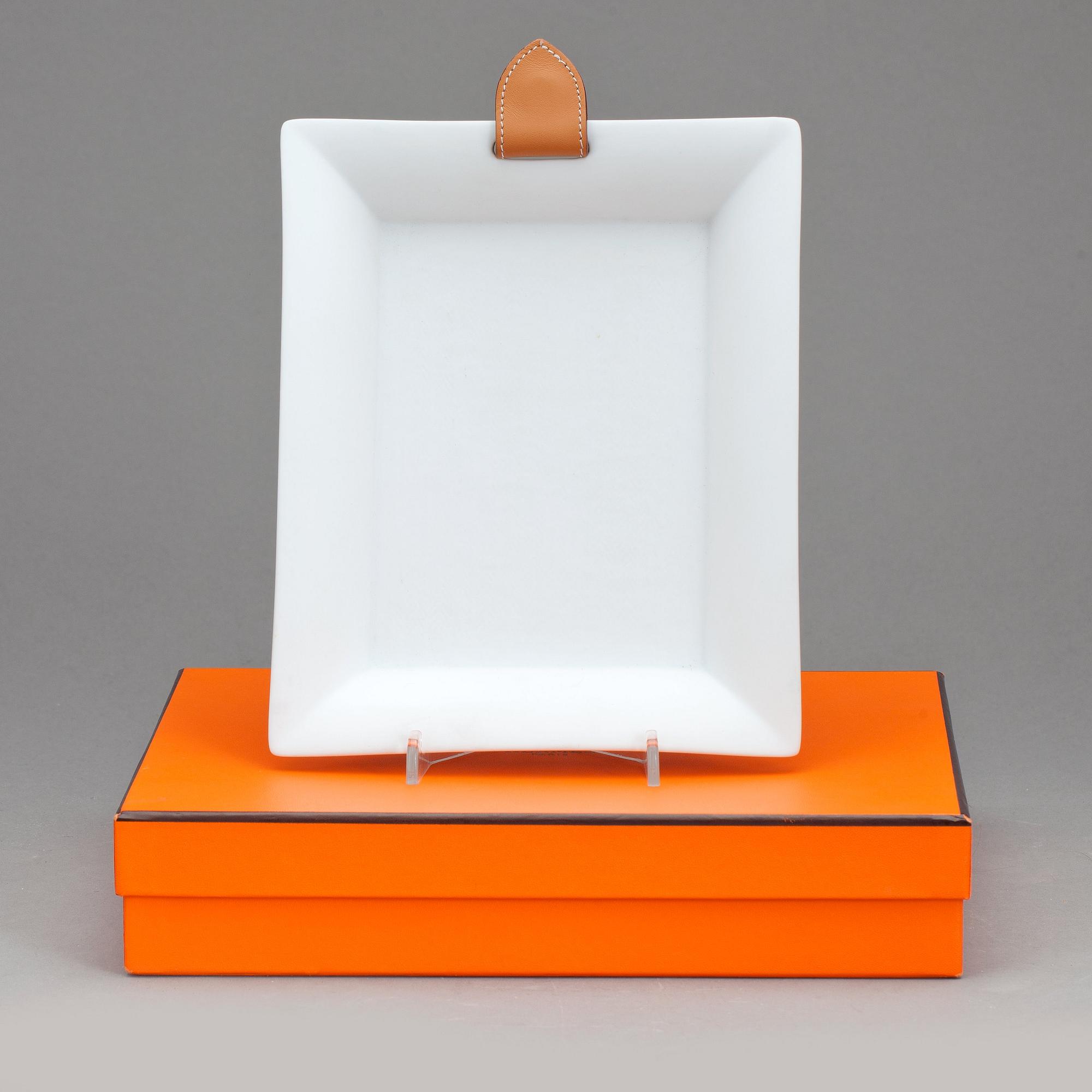 HERMÈS, a unglazed porcelain tray.