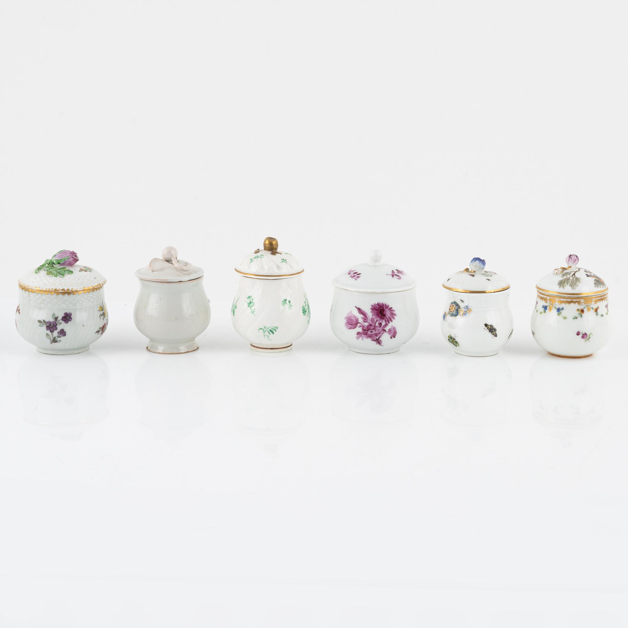 Two dinner plates and 11 custard cups with covers, 18th/20th Century.