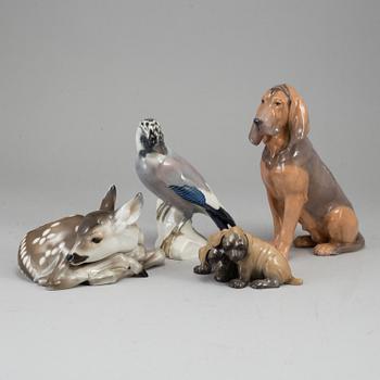 A group of four porcelain figurines of animals, incl. Royal Copenhagen and Rörstrand.