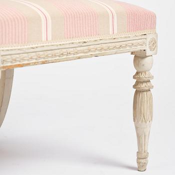 A pair of late Gustavian open.back armchairs, Stockholm, late 18th century.