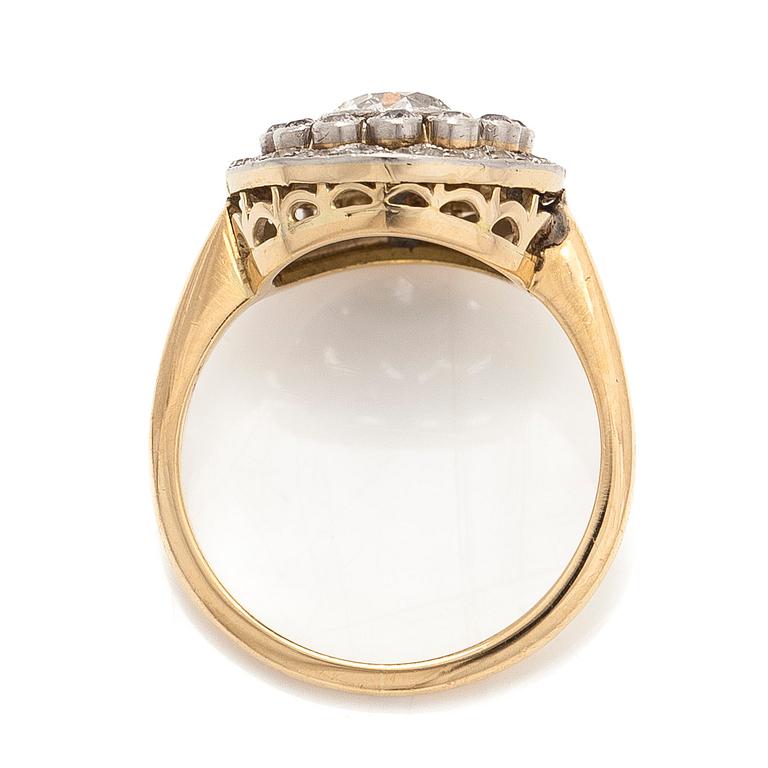 An 18K gold ring, set with old- and single-cut diamonds.