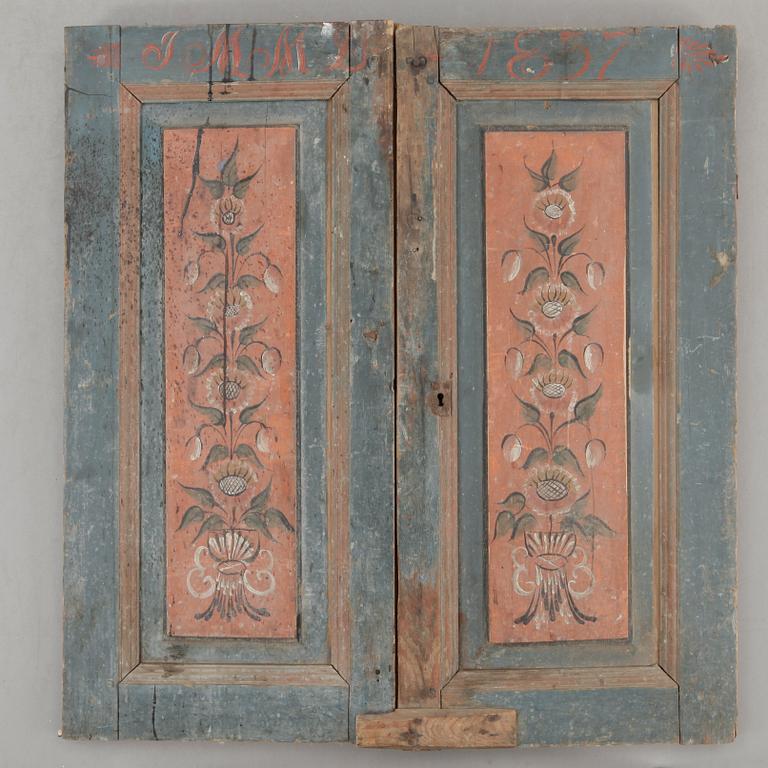 DÖRRAR, ett par, allmoge, Ljusdal, Hälsingland, bär datering 1857.