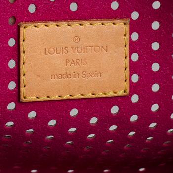 A Louis Vuitton hand bag.