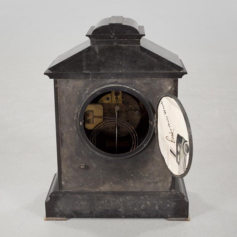 A 19th century mantle piece clock marked Swinden & sons.