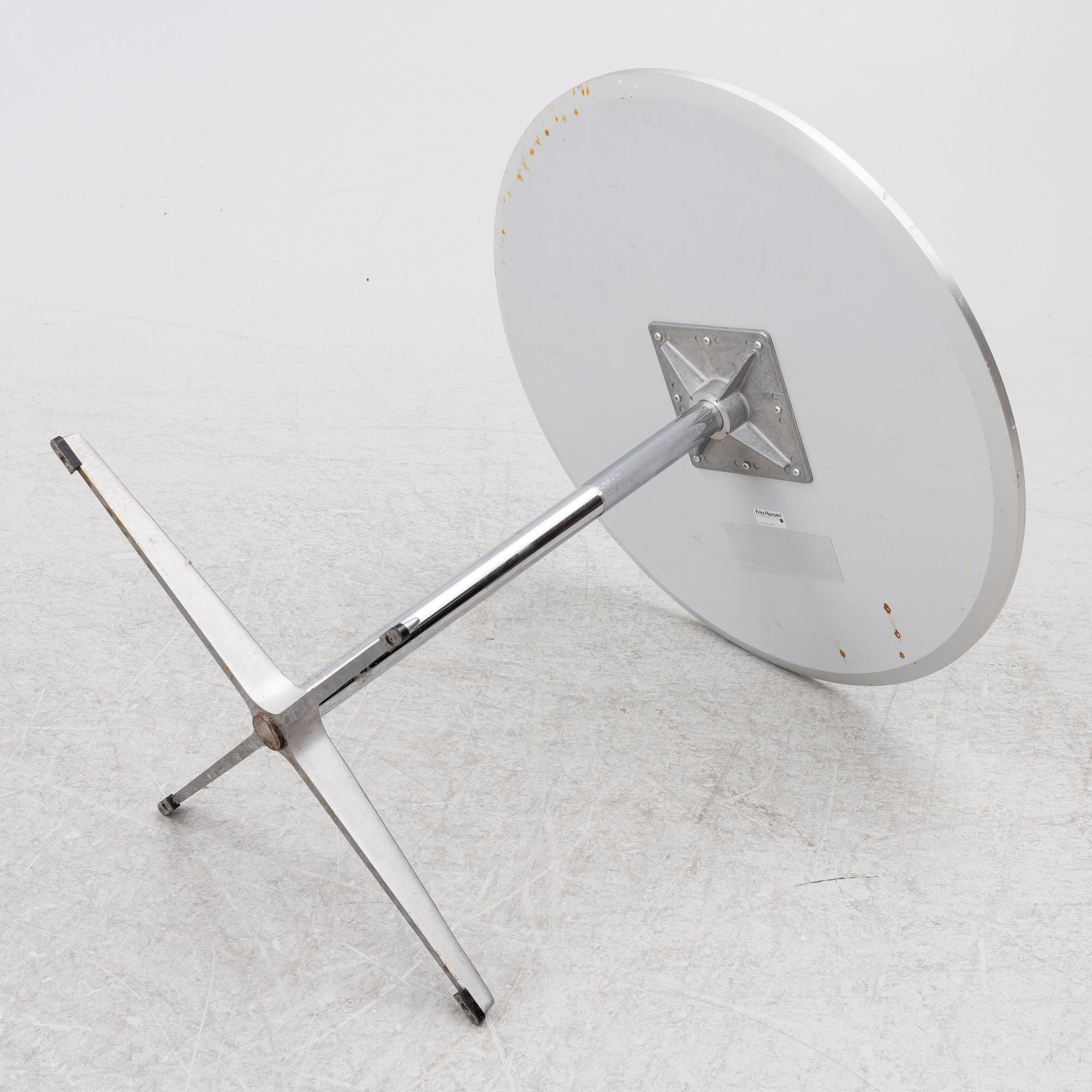 Arne Jacobsen, A coffee table, by Fritz Hansen, dated 2000.