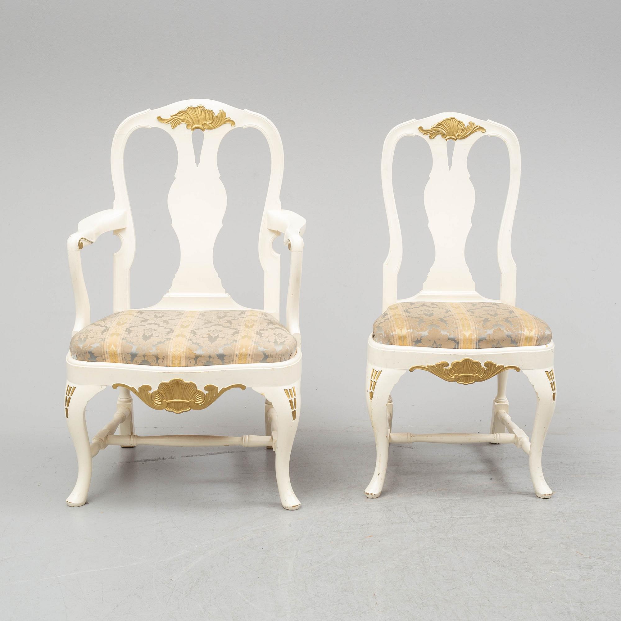 A dining table and six chairs, rococo style, mid 20th century.