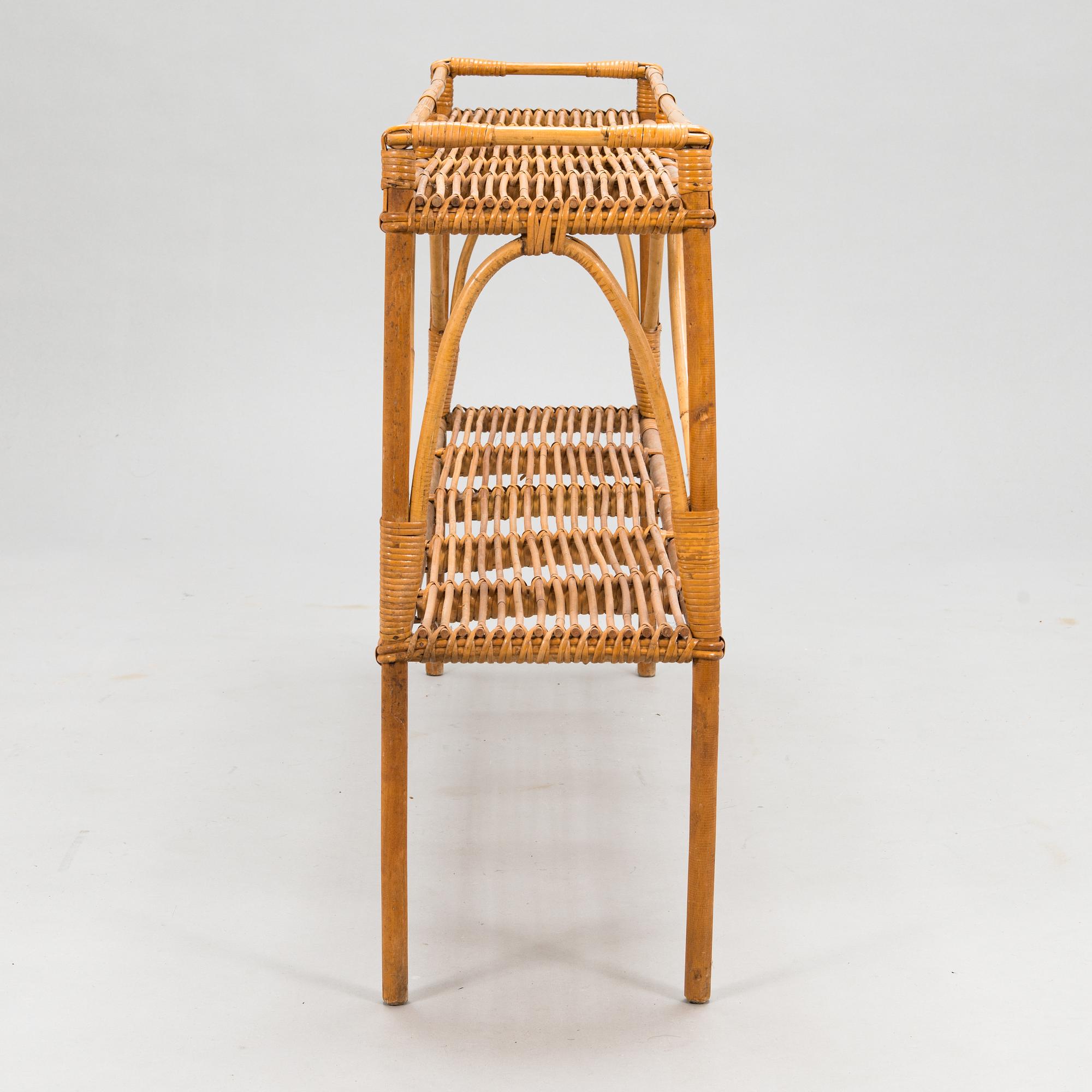A mid 20th century rattan flower table.