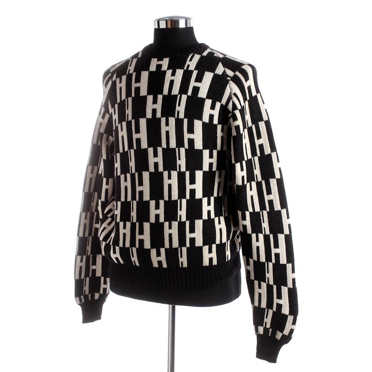 HERMÈS, a men black and white monogrammed wool sweater.