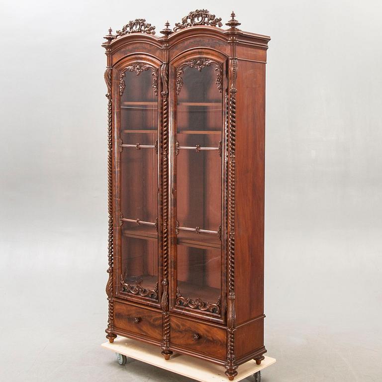 A late Empire mahogany book case.