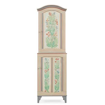 Carl Malmsten, an 'Iceland' cabinet, with carved and painted floral decoration.