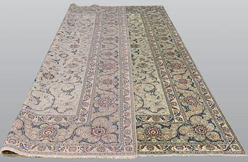 A carpet, Kashan, signed, ca 404 x 280 cm.