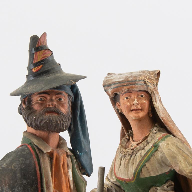 Figuriner ett par Italien omkring 1900.