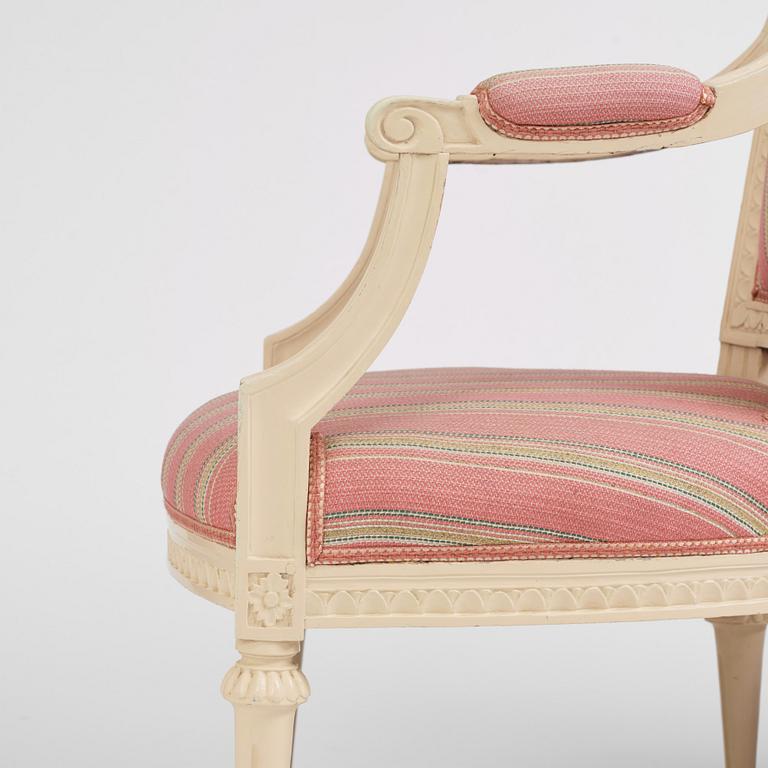 A pair of late Gustavian open armchairs by E. Öhrmark (master in Stockholm 1777-1813).