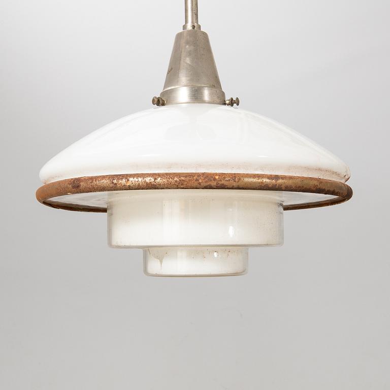 Otto Müller, taklampa, "Sistrah-pendel", Megaphos, 1900-talets första hälft.