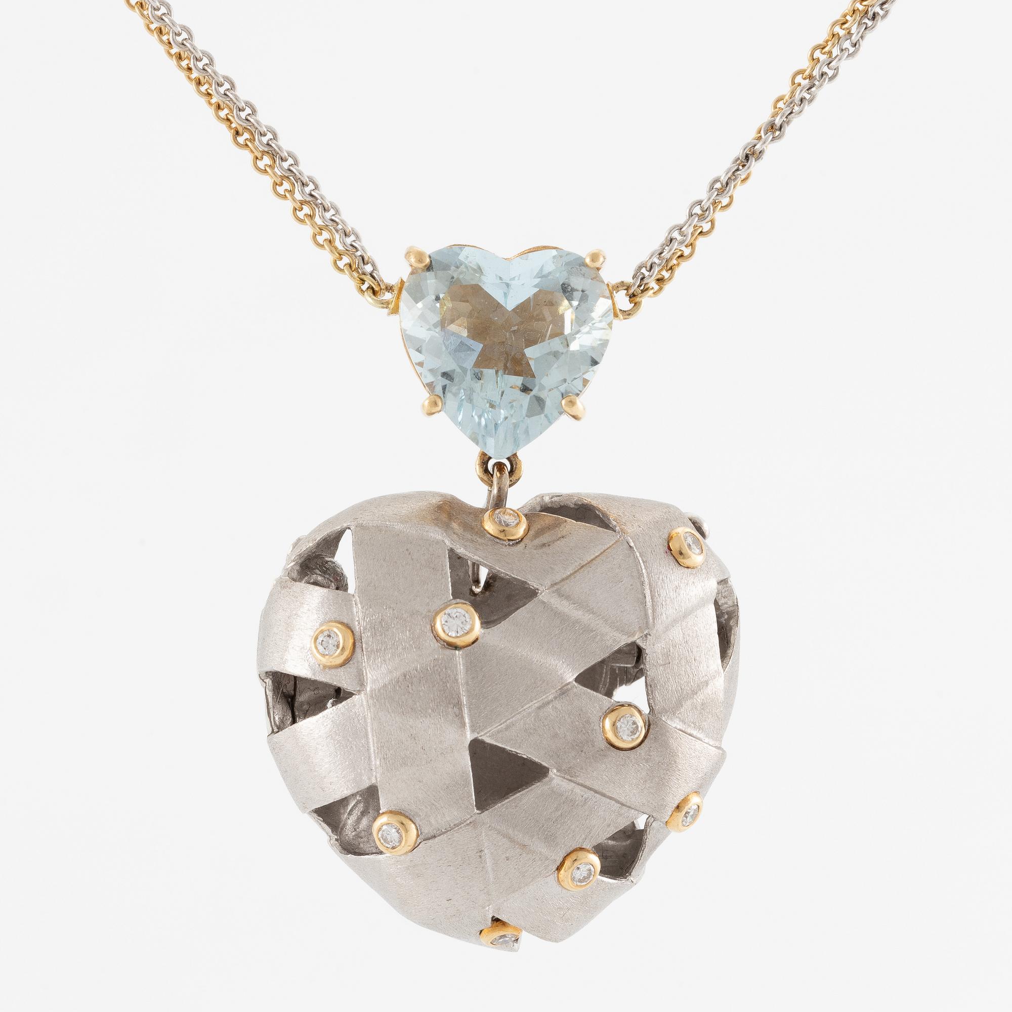 Ole Lynggaard, necklace in 18K gold and white gold with a heart-shaped aquamarine and brilliant-cut diamonds.