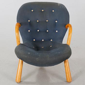 A chair attributed to Philip Arctander, model "Clam Chair" or "Muslinge", 1940s/50s.