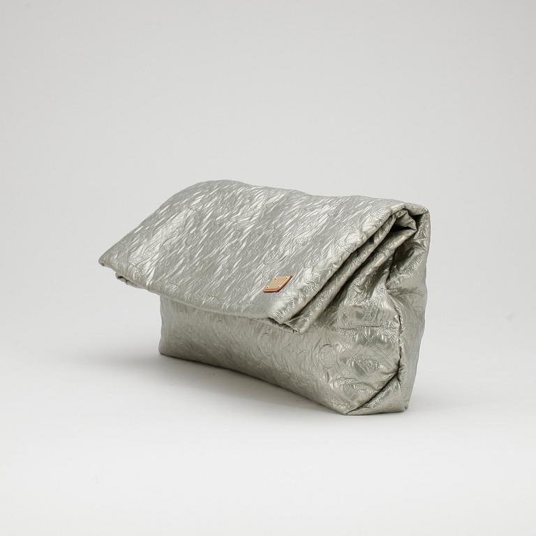 LOUIS VUITTON, a monogram silver colored clutch.