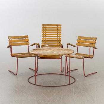 A mid 20th century Garden armchairs, easy chair and a table, Bjärnum, Sweden.