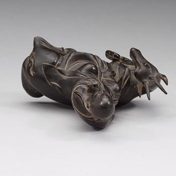 A bronze figure of Sholou on a reclining deer, Qing dynasty (1644-1912).