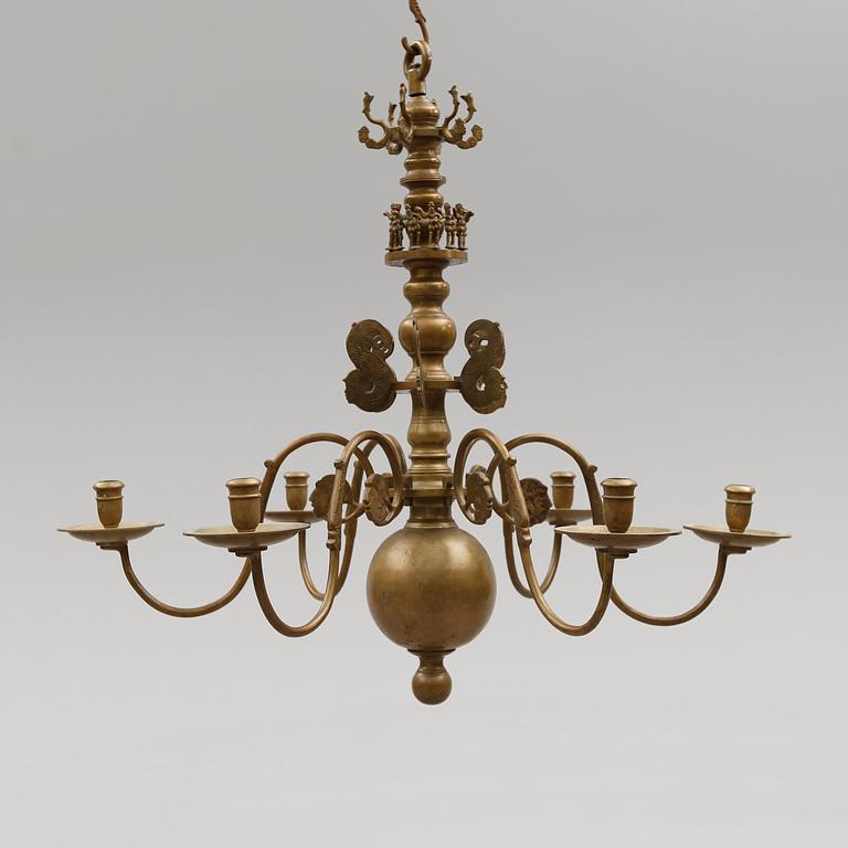 TAKKRONA, malm, 1900-talets första hälft. Höjd ca 80 cm.