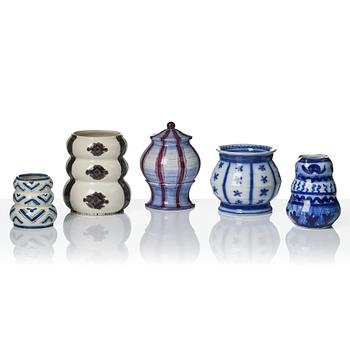 Wilhelm Kåge, a jar with cover, and four vases, creamware and porcelain, Gustavsberg, Sweden, 1917-1920.