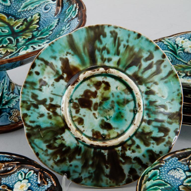 Eighteen majolica small plates and a serving dish from Rörstrand, second half of the 19th century.