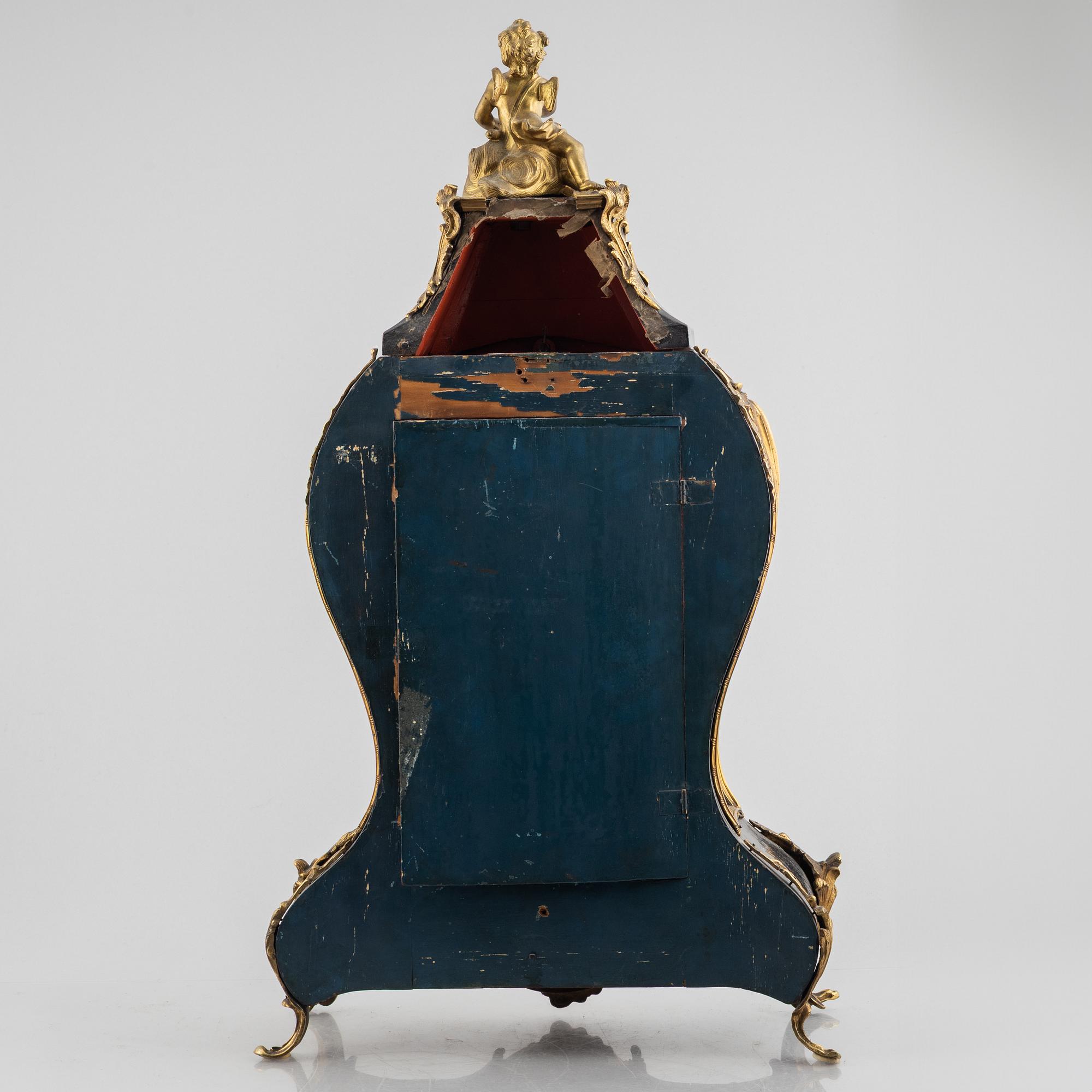 Clock, Rococo style with partially older parts, around the year 1900.