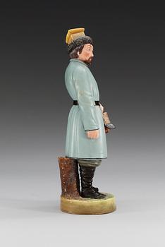 A Russian bisquit figure of a Kalmykian man, Gardner/Kuznetsov manufactory, ca 1900.