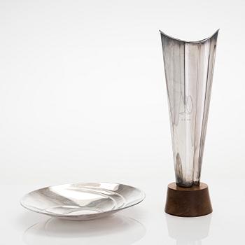 Tapio Wirkkala, a 'Flame' silver vase, and a silver dish, Kultakeskus, Hämeenlinna, 1962 and 1961.