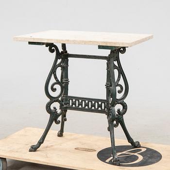 A set of three garden chairs and one cast iron and marble table first half of the 20th century.