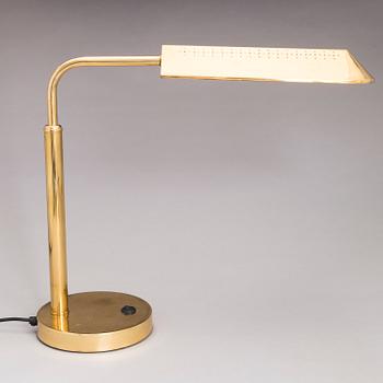 A pair of second half of the 20th century brass table lamps.
