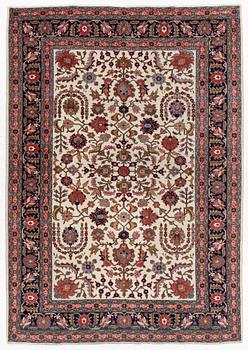 A semi-antique Tabriz carpet, c. 282 x 198 cm.
