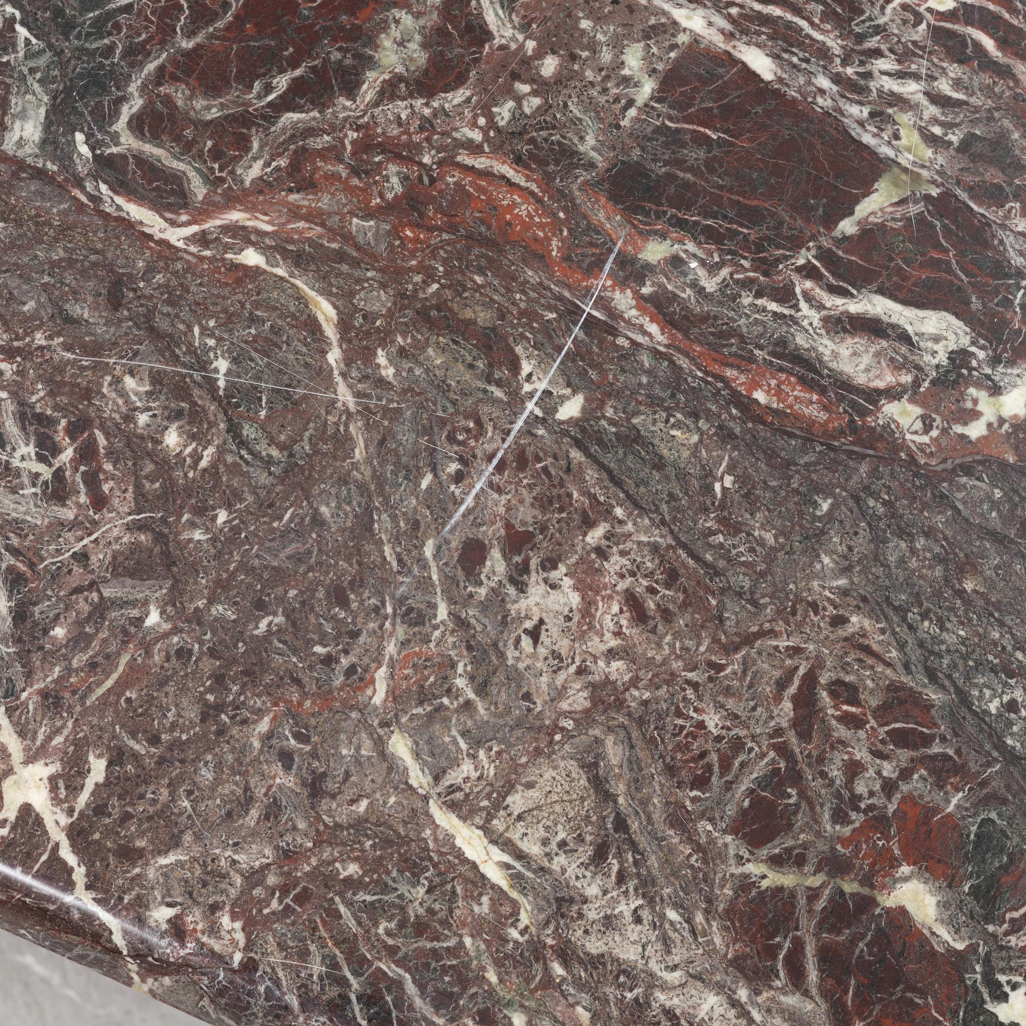 A stone coffee table, late 20th Century.