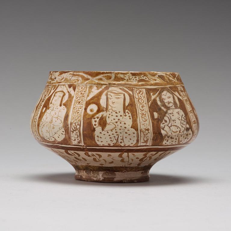 A BOWL, pottery with luster decor, height ca 10,5 cm, Persia/Iran 12th-13th century.