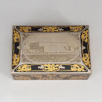 A steel and brass cigarr box by Emil Olsson Eskilstuna around 1900.