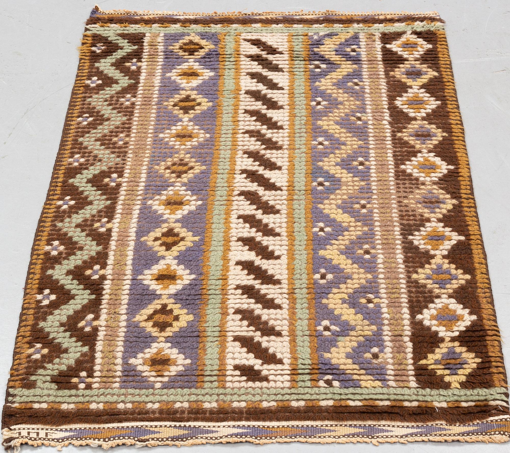 Märta Måås-Fjetterström, a carpet, "Blå randig", knotted pile, ca 141,5-143 x 83-85 cm, signed MMF.