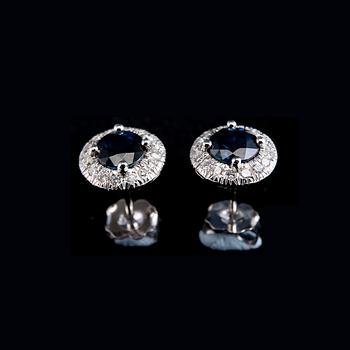 A PAIR OF EAR STUDS, Ceylon sapphires 1.15 ct, 32 brilliant cut diamonds 0.25 ct W/vs.