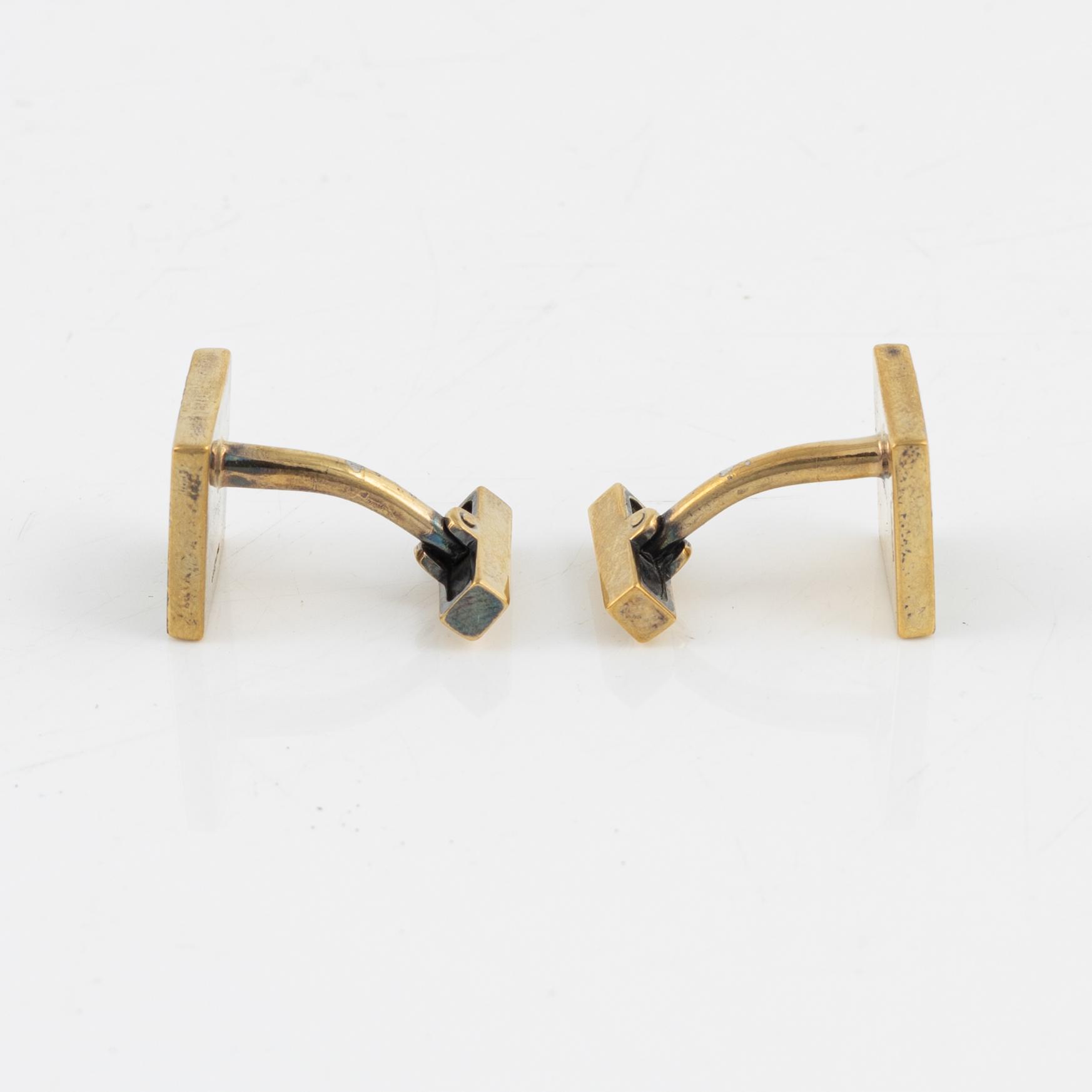 Louis Vuitton, a pair of gold plated silver cufflinks.